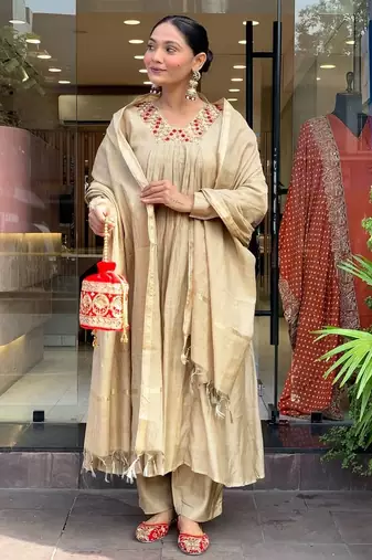 Beige color stylish trendy looking kurta set for stylish looks