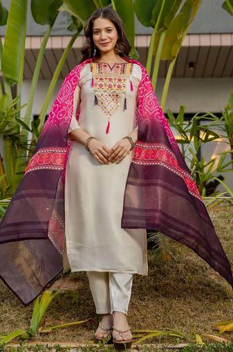 Cream color stylish trendy looking designer kurta set for stylish looks