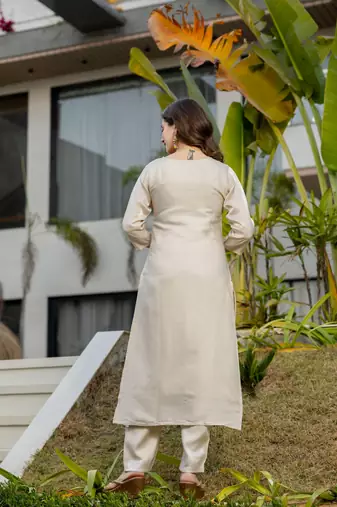 Cream color stylish trendy looking kurta set for stylish looks