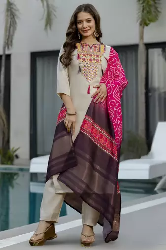 Cream color stylish trendy looking kurta set for stylish looks