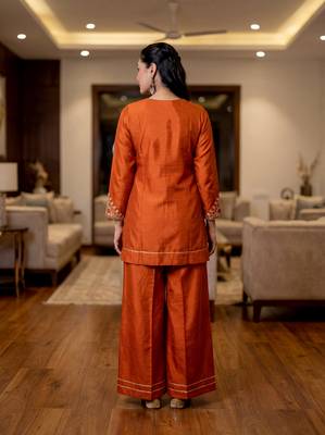 Orange color stylish trendy looking kurta set for stylish looks 2