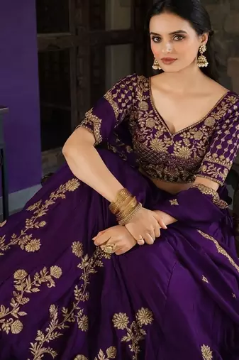 violet silk lehenga choli set with gold threadwork