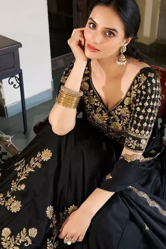 black silk lehenga choli with gold threadwork design