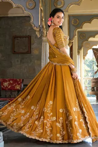 yellow silk lehenga choli with thread embroidery