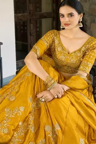 yellow silk lehenga choli with thread embroidery