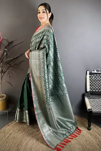 Green banarasi silk zari woven ethnic motifs kanjivaram sarees