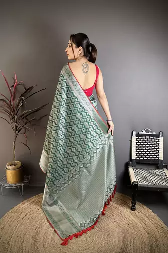 Green banarasi silk zari woven ethnic motifs kanjivaram sarees