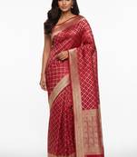 Red banarasi silk saree with blouse piece.