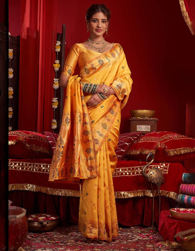 Light orange silk floral motifs woven work paithani saree