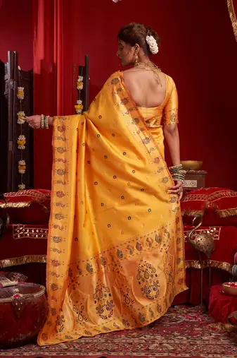 Light orange silk floral motifs woven work paithani saree