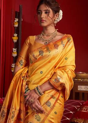 Light orange silk floral motifs woven work paithani saree 4