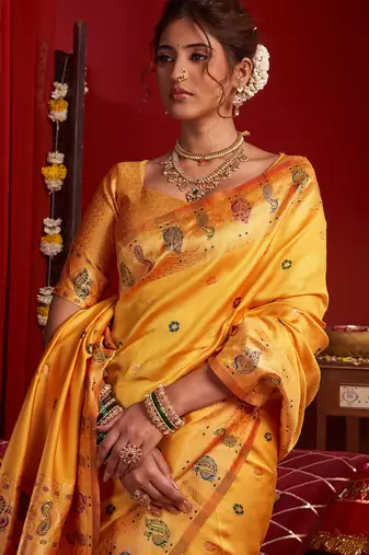 Light orange silk floral motifs woven work paithani saree