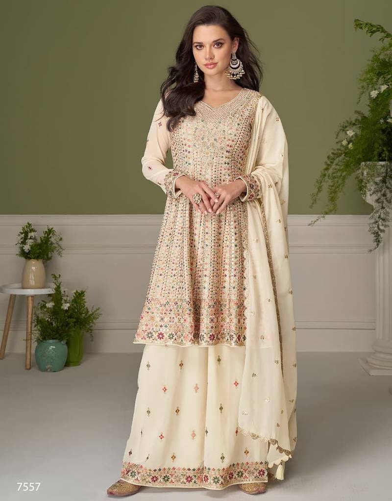Off white free size upto 42 heavy georgette palazzo suits