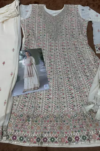 Off white free size upto 42 heavy georgette palazzo suits
