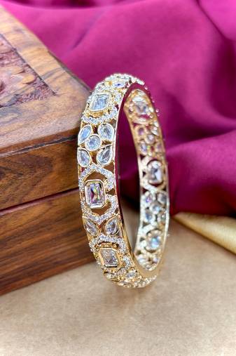 Gold ad designer bangles