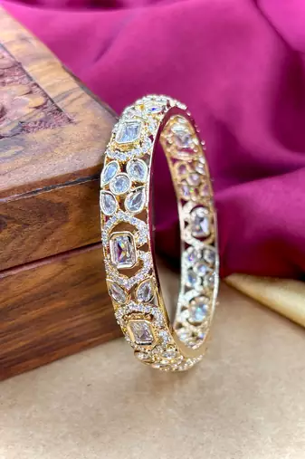 Gold ad designer bangles