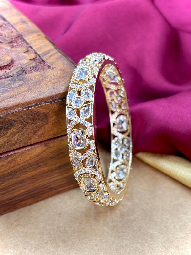 Gold ad designer bangles