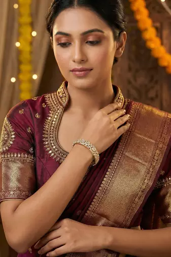 Gold ad designer bangles