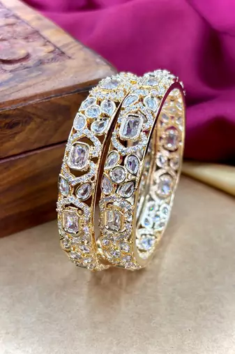 Gold ad designer bangles