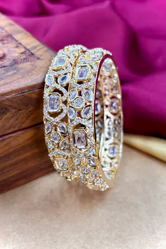 Gold ad designer bangles