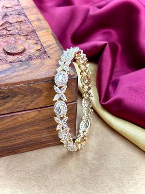 Gold ad ethnic bangles 1