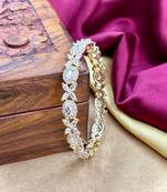 Gold ad ethnic bangles