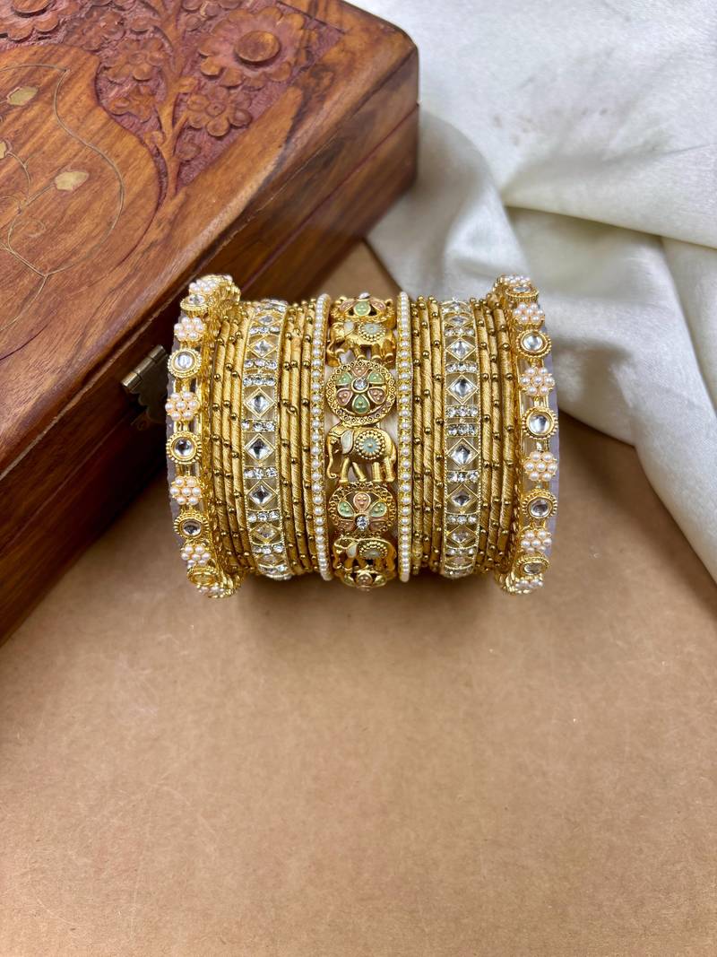 Designer gold silk thread bangles set