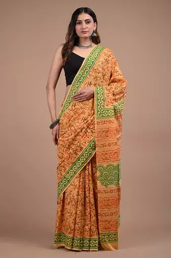 Orange cotton hand block printed mulmul sarees with attach printed blouse