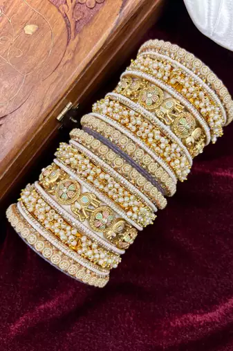 Temple style gold bangles set