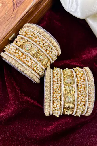 Temple style gold bangles set