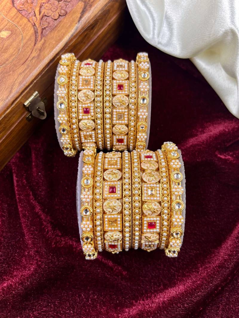 Traditional pearl gold bangles