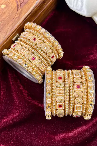 Traditional pearl gold bangles