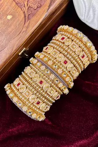 Traditional pearl gold bangles