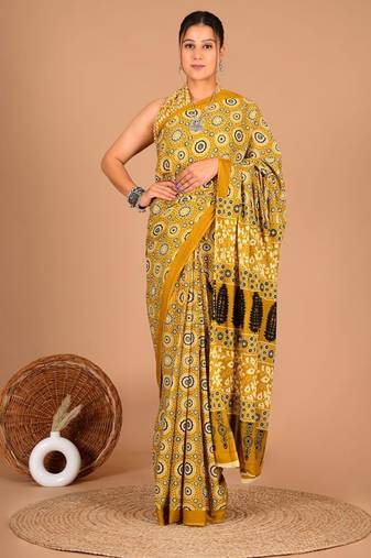 Yellow soft mul cotton saree with unstiched attached blouse piece