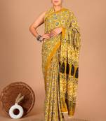 Yellow soft mul cotton saree with unstiched attached blouse piece