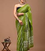 Green soft mul cotton saree with unstiched attached blouse piece