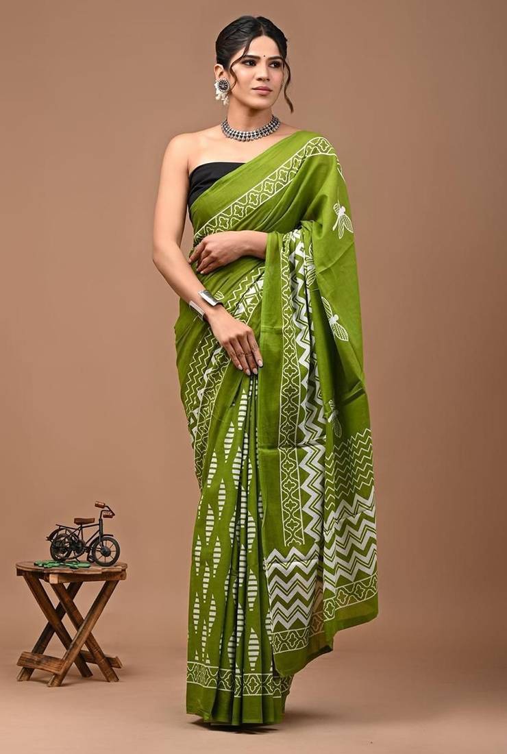 Green soft mul cotton saree with unstiched attached blouse piece