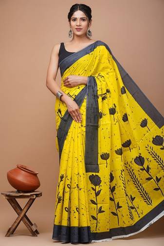 Yellow soft mul cotton saree with unstiched attached blouse piece