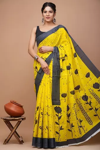 Yellow soft mul cotton saree with unstiched attached blouse piece
