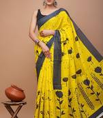 Yellow soft mul cotton saree with unstiched attached blouse piece