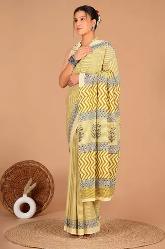 Yellow soft mul cotton saree with unstiched attached blouse piece