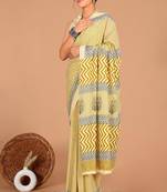 Yellow soft mul cotton saree with unstiched attached blouse piece