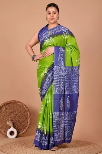 Green soft mul cotton saree with unstiched attached blouse piece