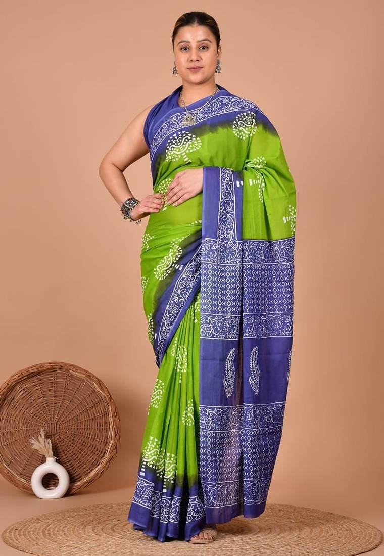 Green soft mul cotton saree with unstiched attached blouse piece