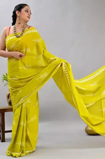 Yellow soft mul cotton saree with unstiched attached blouse piece