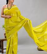 Yellow soft mul cotton saree with unstiched attached blouse piece