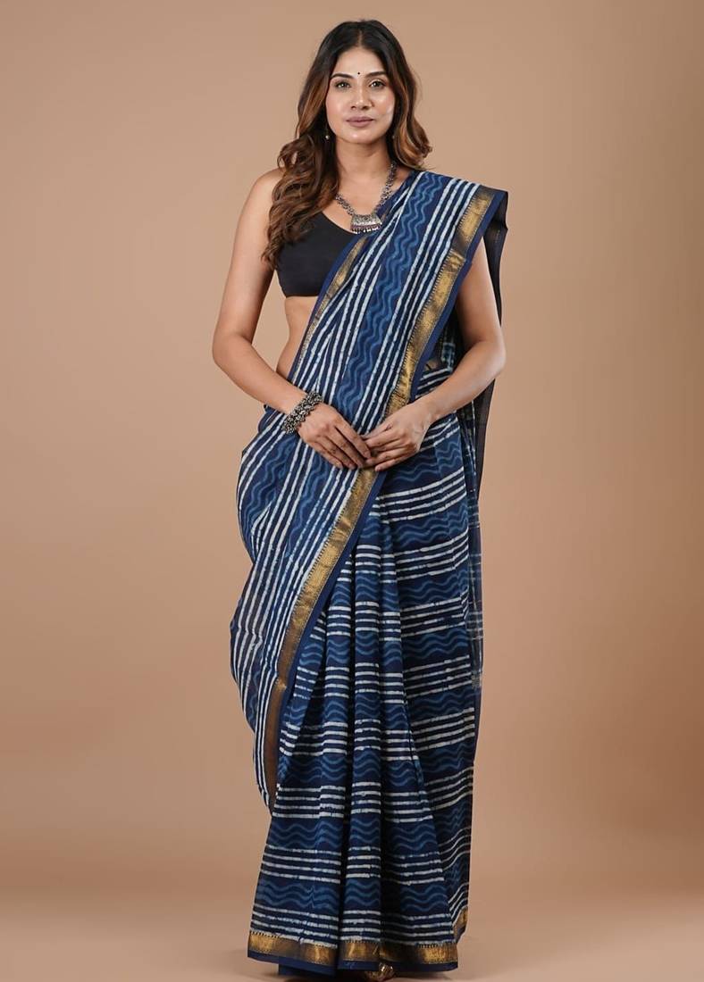 Blue maheshwari silk saree with woven borders and beautiful hand block print