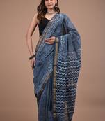 Blue maheshwari silk saree with woven borders and beautiful hand block print