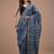 Blue maheshwari silk saree with woven borders and beautiful hand block print