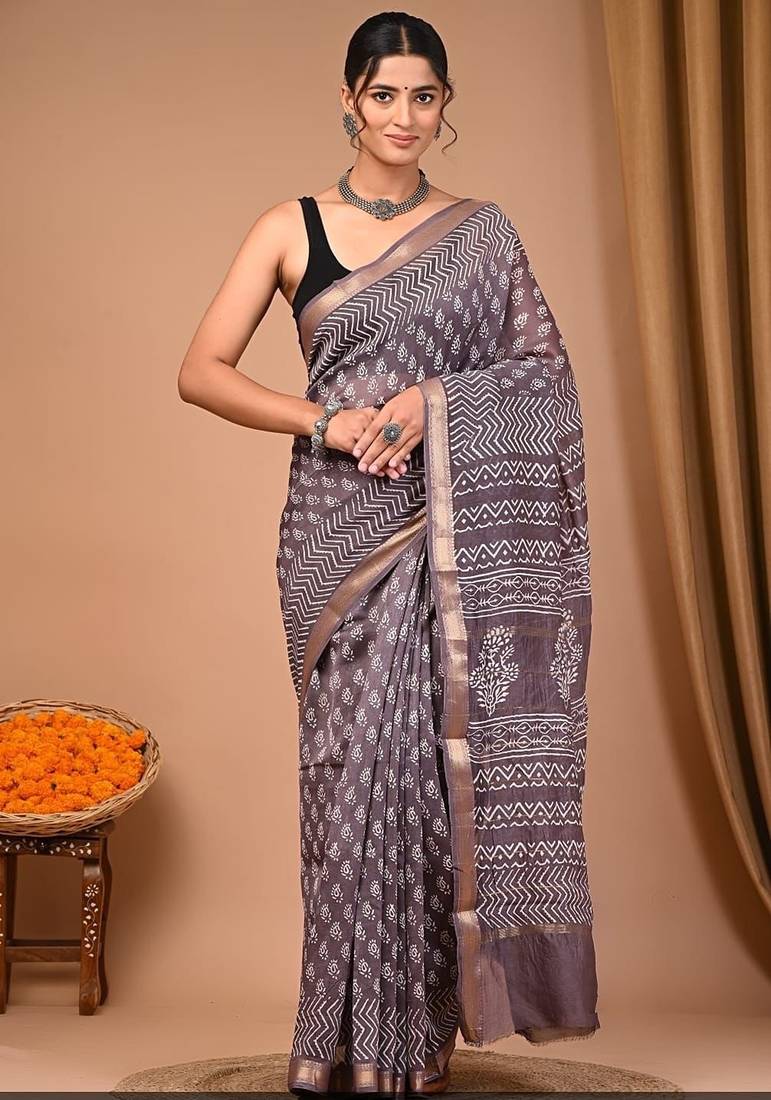 Grey maheshwari silk saree with woven borders and beautiful hand block print